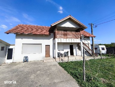 Casa cu 4 camere cu teren de 14,340 mp + platforma de beton cu hala