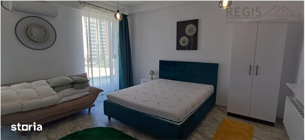 Garsoniera moderna si spatioasa