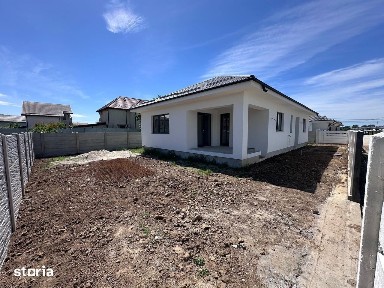 Casa cu incalzire in pardoseala, tripan si placa de beton - Domnesti