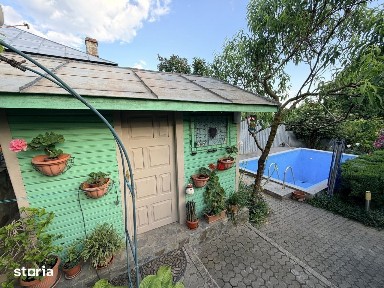 Casa cu piscina si gradina de vis in centrul Domnestiului