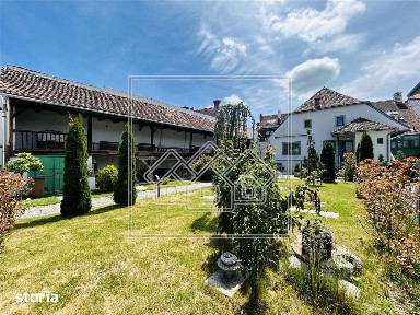 Casa cu 6 apartamente + gradina - pretabil investitii