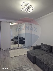 Apartament luminos cu 2 camere, mobilat complet si cu loc de parcare