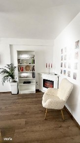 Apartament cu 2 camere, curte cu loc de joacă și foișor