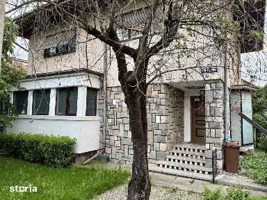Apartament cu garaj, grădină, aer conditionat și centrală proprie