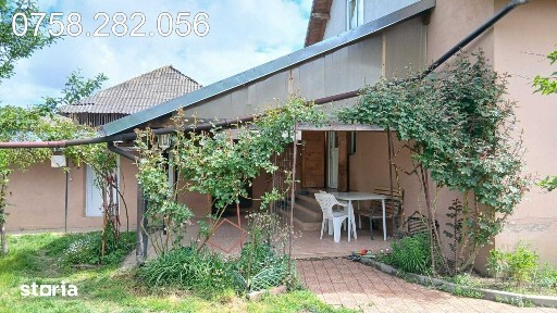 Casa la tara cu anexe, garaj, aer conditionat, liniste si teren 50 ari