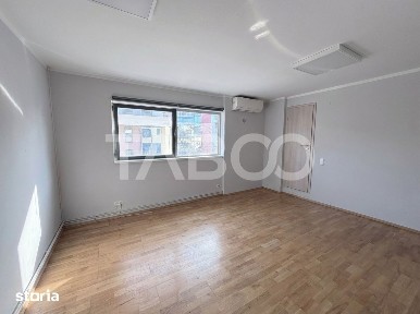 Cladire de birouri cu spatiu comercial la parter si 6 locuri parcare