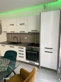 Inchiriez pe termen lung apartament cu doua camere tip studio