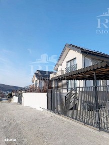 Casa individuala cu 500 mp teren semifinisata, zugravita in alb