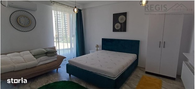 Garsoniera moderna si spatioasa