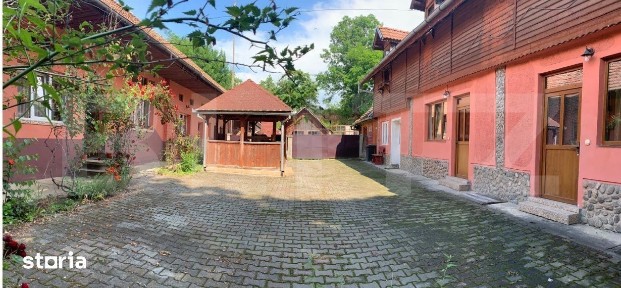 Pensiune + casa pe 5.500 mp, la poalele Muntilor Fagaras - Gura-Vaii