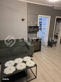 Apartament pe 2 nivele, 3 camere, balcon, bloc nou-zona Centrala