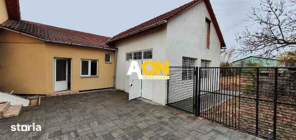 Casa 4 camere, 1163 mp teren, hala 65 mp utili, pretabila pt. birouri