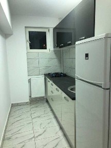 Titan garsoniera libera decomandata bloc mixt