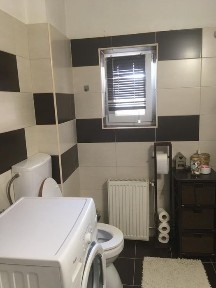 Apartament la casă de inchiriat