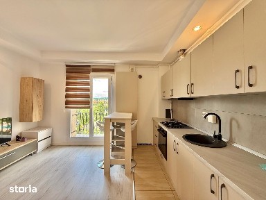 COSMOPOLIS - Apartament cu 2 camere tip studio, mobilat si utilat.