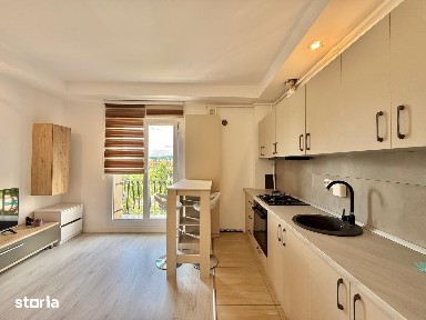 COSMOPOLIS - Apartament cu 2 camere tip studio, mobilat si utilat.