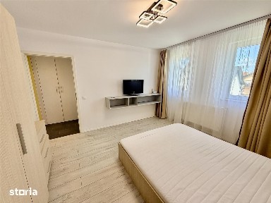 Apartament 2 camere - mobilat și utilat - balcon, pod și parcare