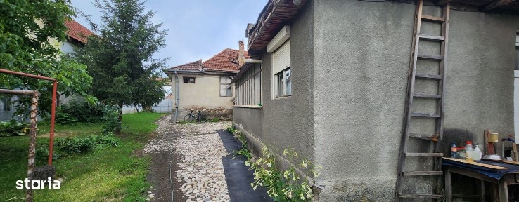 Casa din caramida pe D+P+Pod,Str. Republicii in Sanpetru,teren 1819 mp