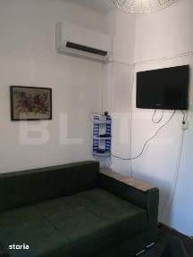 Garsoniera la casa cu curte si terasa in zona Centrala