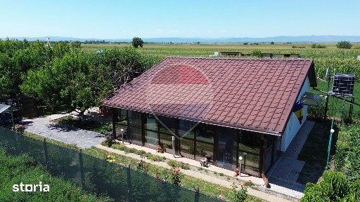 Casă 2 camere teren 6943mp Gologanu
