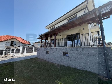 Casa individuala de 120mp, teren 500mp, finisata modern, zona Chinteni