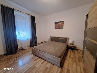 Apartament cu gradina la curte comuna-complet mobilat si utilat-Piata