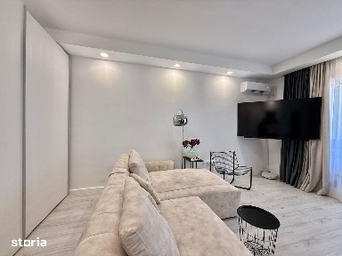 COSMOPOLIS - Apartament cu 2 camere, mobilat. Loc de paracare inclus