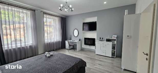 Apartament de vanzare cu terasă și beci, gata de utilizare