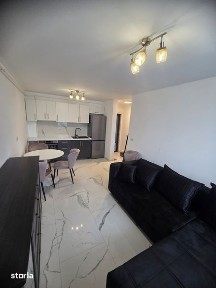 Vand apartament nou compet mobilat si utilat + loc de parcare
