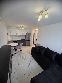 Vand apartament nou compet mobilat si utilat + loc de parcare