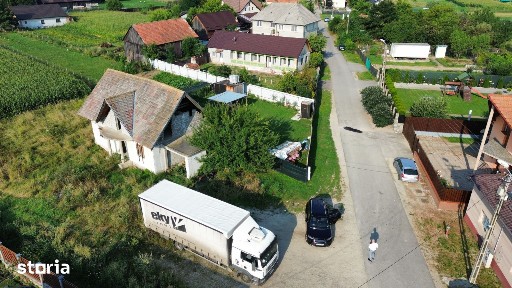 Casa la rosu Lunca Calnicului,Prejmer,Brasov, teren 1000 mp.