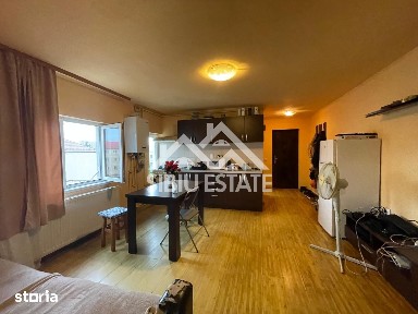 Apartament luminos cu 2 camere, la mansardă, în zonă căutată