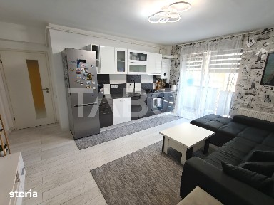Apartament decomantat 3 camere 2 bai 70 mp utili cu parcare subterana