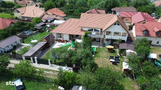 Casa 8 camere,teren 1027 mp, foisor si gratar,Micesti