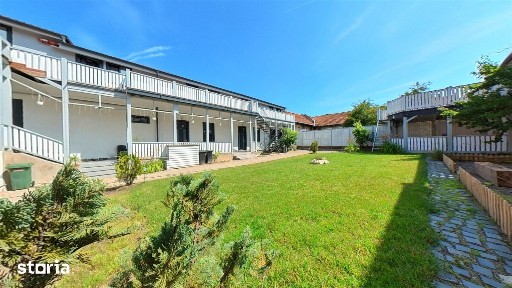Apartament cu 3 camere - curte cu foisor + spatiu parcat masina