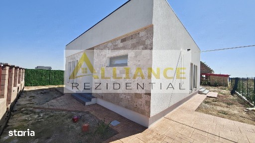 Casa pe parter cu 3 camere, 2 bai si teren de 375 mp