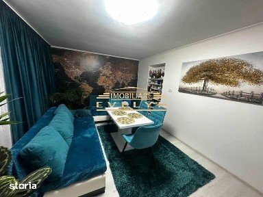 Apartament 3 camere transformat în 2 camere de vânzare - Str.