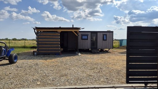 Teren 750 m. si casa mobila