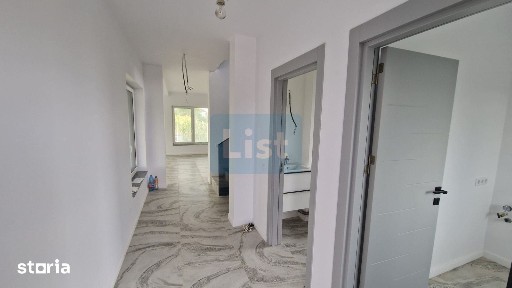 Casa moderna si spatioasa cu 3 dormitoare 2 garaje in Sasar Comision 0