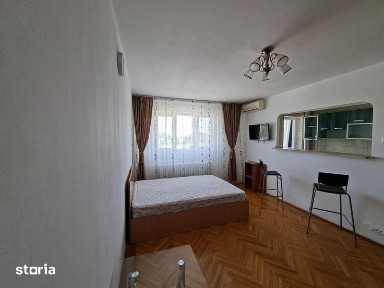 Titan proprietar garsoniera