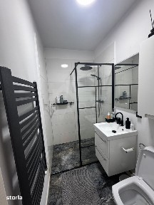 Apartament cu o camera ultracentral la casa cu curte comuna