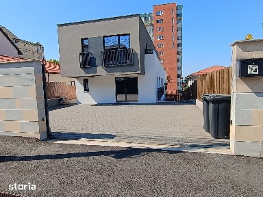 Cladire moderna, superfinisata 500 mp, compus din 4 apartamente, teren