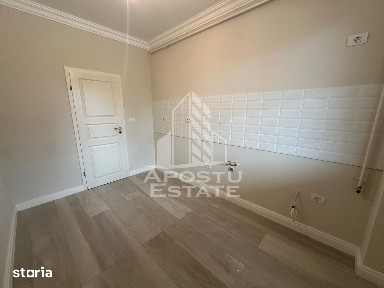 Apartament cu 2 camere si curte bucatarie separata in Giroc la asfalt