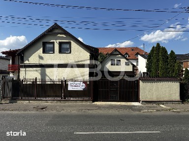 Casa individuala de vanzare acces cu auto in curte pe malul Cibinului