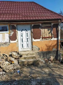 Teren 20 de ari/2000mp cu 2 case bătrânești de vanzare