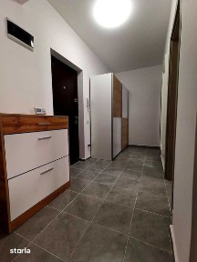 Apartament doua camere cu loc de parcare si curte proprii