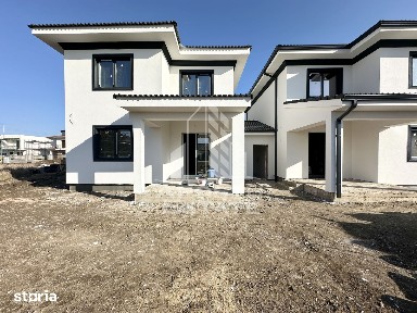 Jumatate de duplex cu 5 camere despartit prin garaj, 131 mp utili