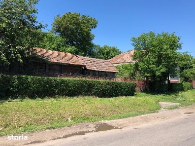 Casa 2 camere bucatarie 2 bai din cărămidă curte mare si teren Râciu