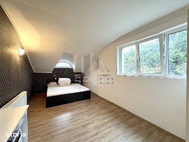 Apartament peste garaj/terasa/curte/parcari.