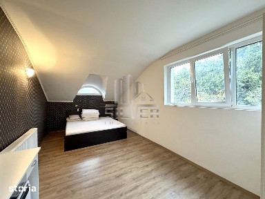 Apartament peste garaj/terasa/curte/parcari.